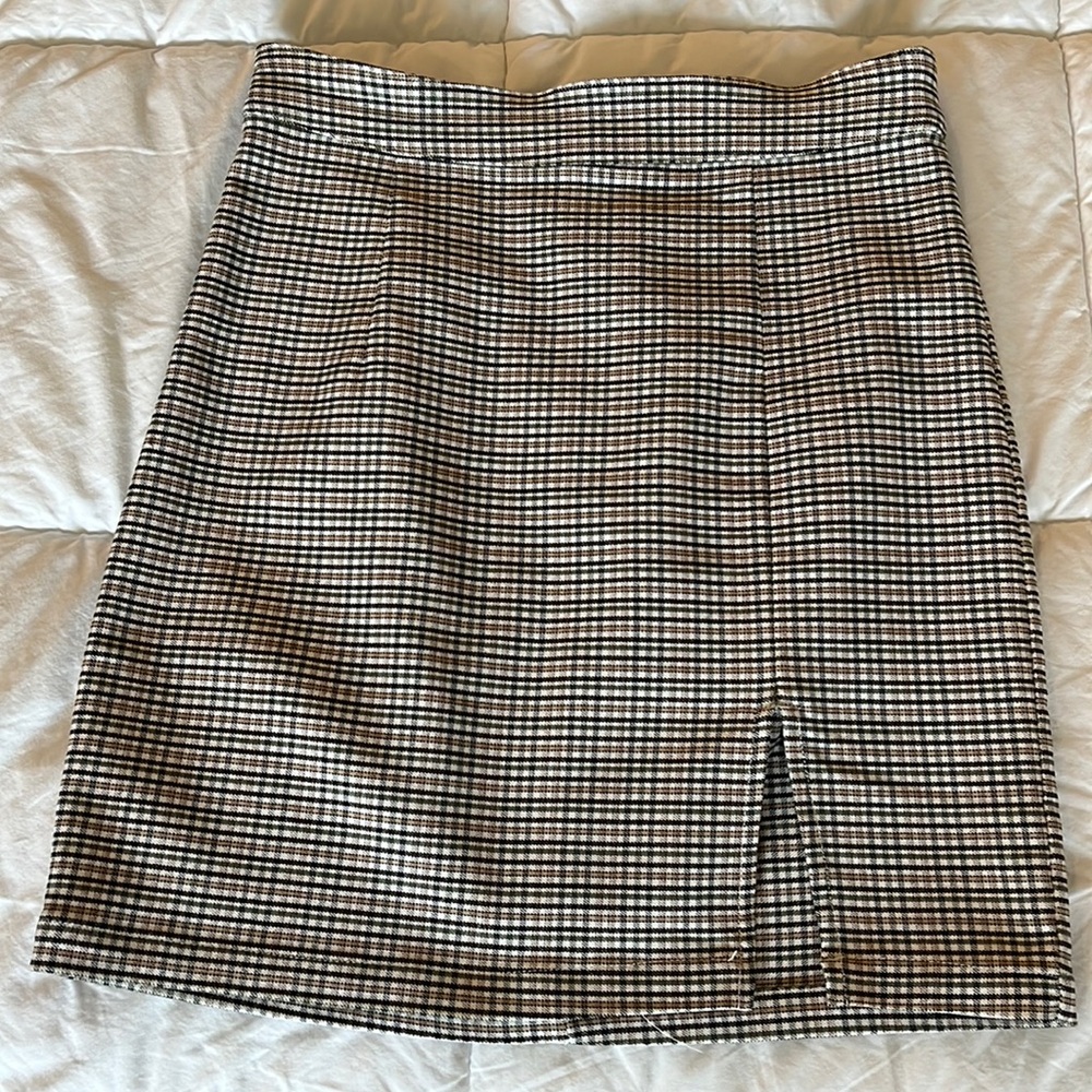 Garage mini skirt with thigh slit. Size XS